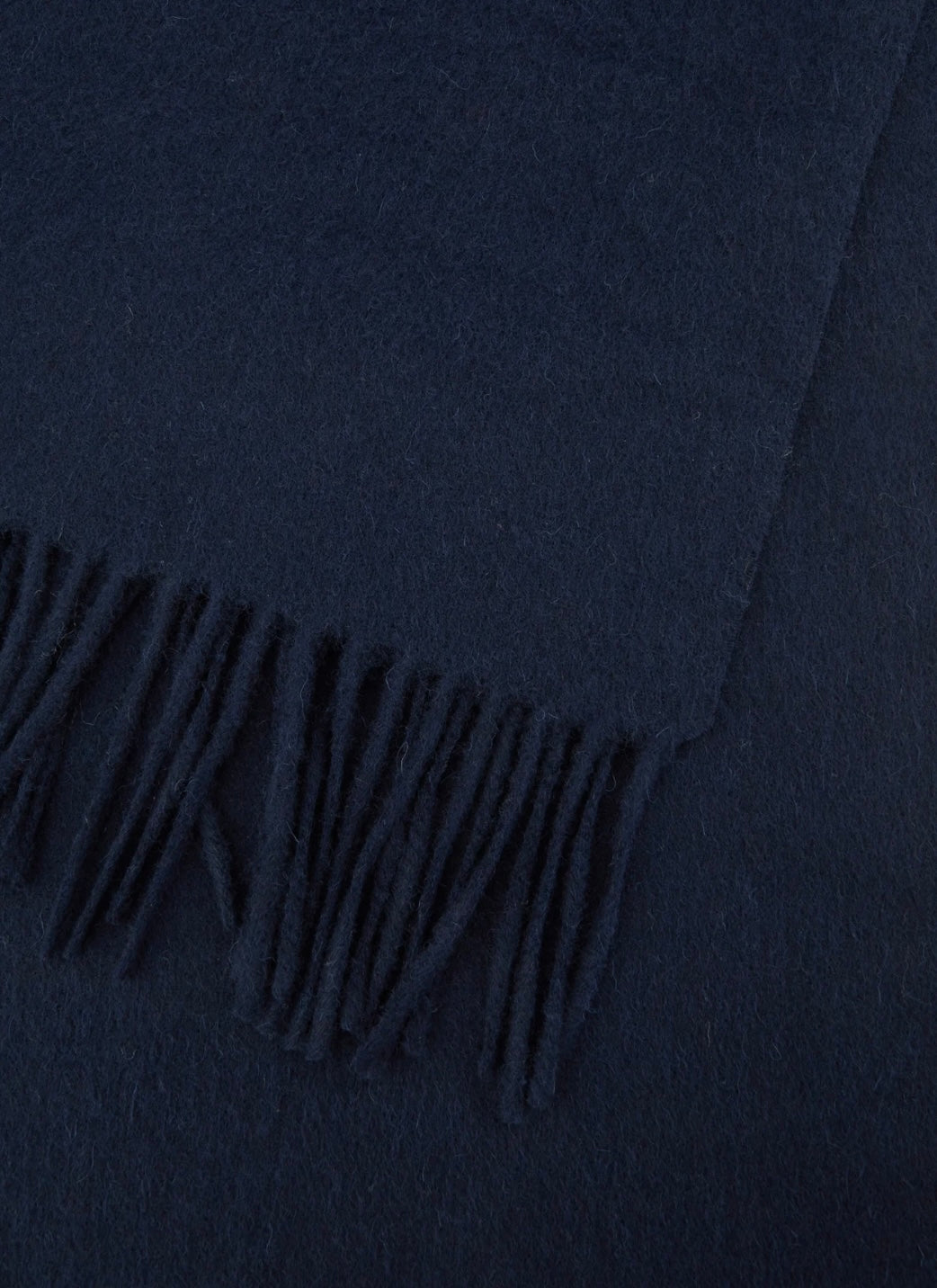 Narrow wool scarf with fringes in navy