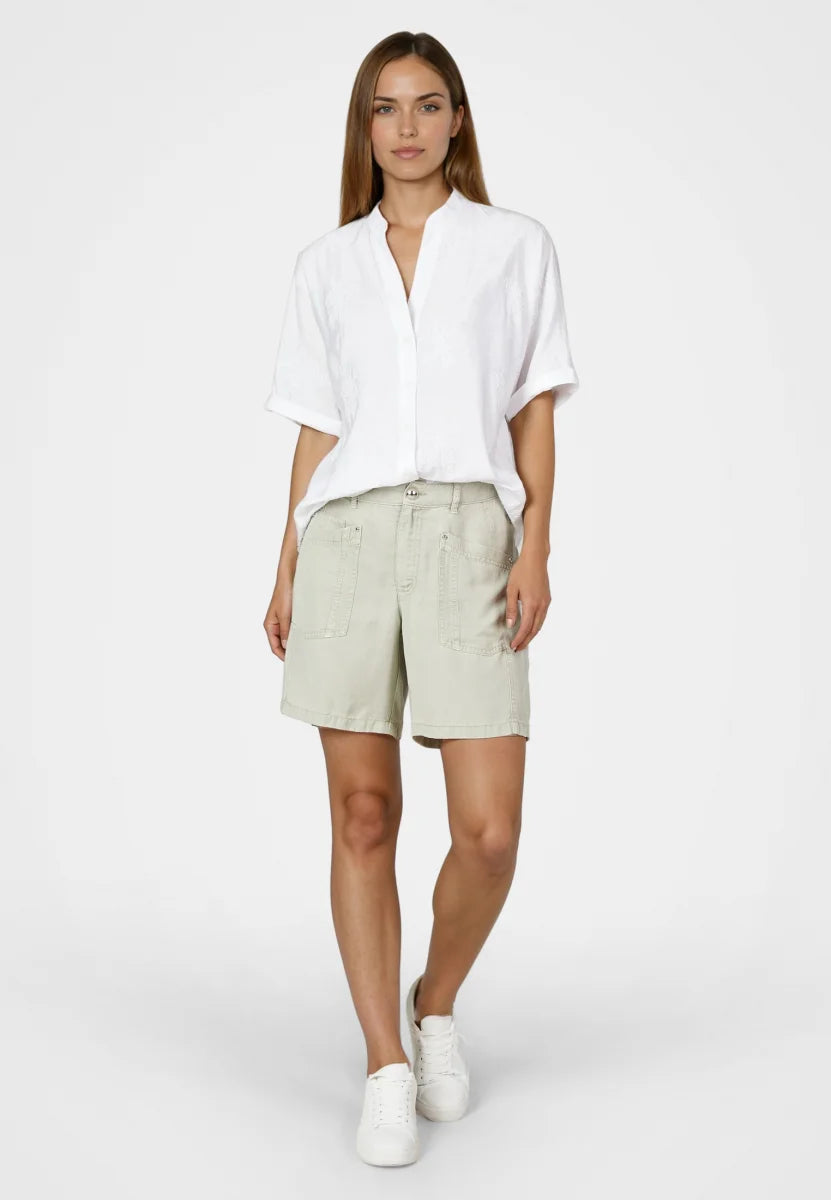 White Tunic blouse made from embroidered fabric