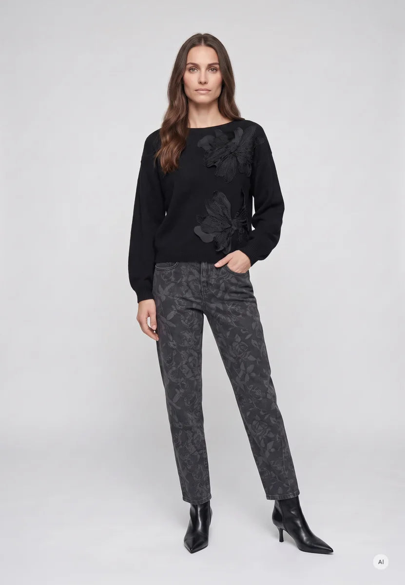 Sweater with floral applications