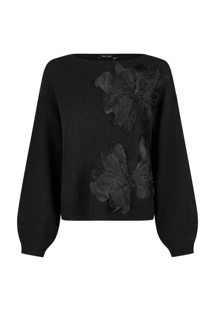 Sweater with floral applications