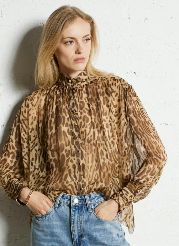 Eco-friendly
New
Suncoo
Flowy printed sheer blouse - Beige – LUX