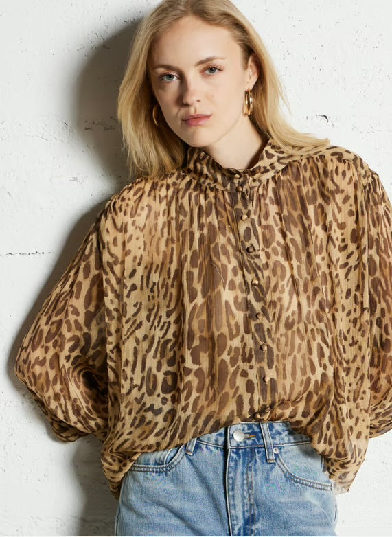 Eco-friendly
New
Suncoo
Flowy printed sheer blouse - Beige – LUX