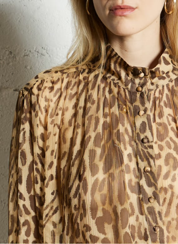 Eco-friendly
New
Suncoo
Flowy printed sheer blouse - Beige – LUX