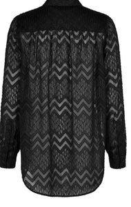 Blouse with transparent zigzag pattern