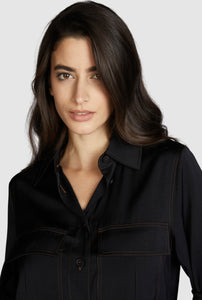 Black blouse with camel stitching