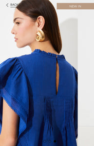 Love
Embroidered linen voile blouse with ruffles in Bleu