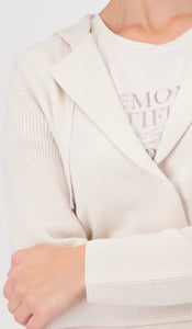 BLAZER WITH KNIT SLEEVES
COLOR: Creamy beige