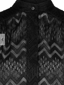 Blouse with transparent zigzag pattern