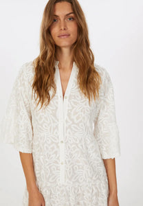 Tiered dress in decorative 3 D lace