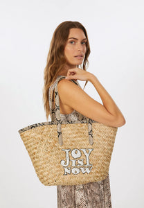 Woven basket with embroidery