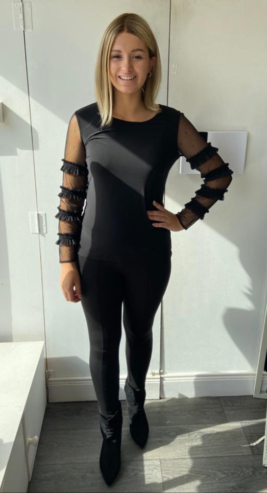 Frank Lyman Black top with net sleeves