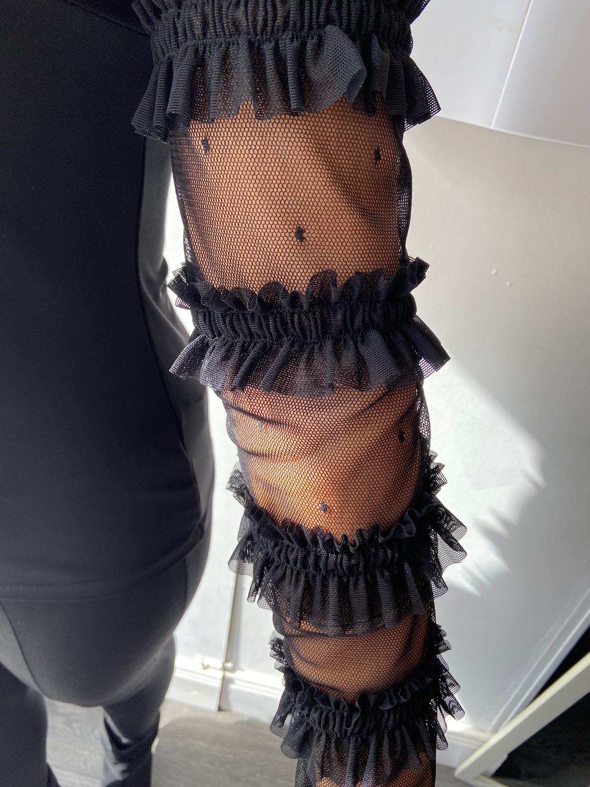 Frank Lyman Black top with net sleeves